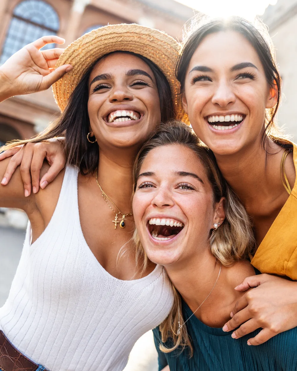 Group of women smiling together outdoors