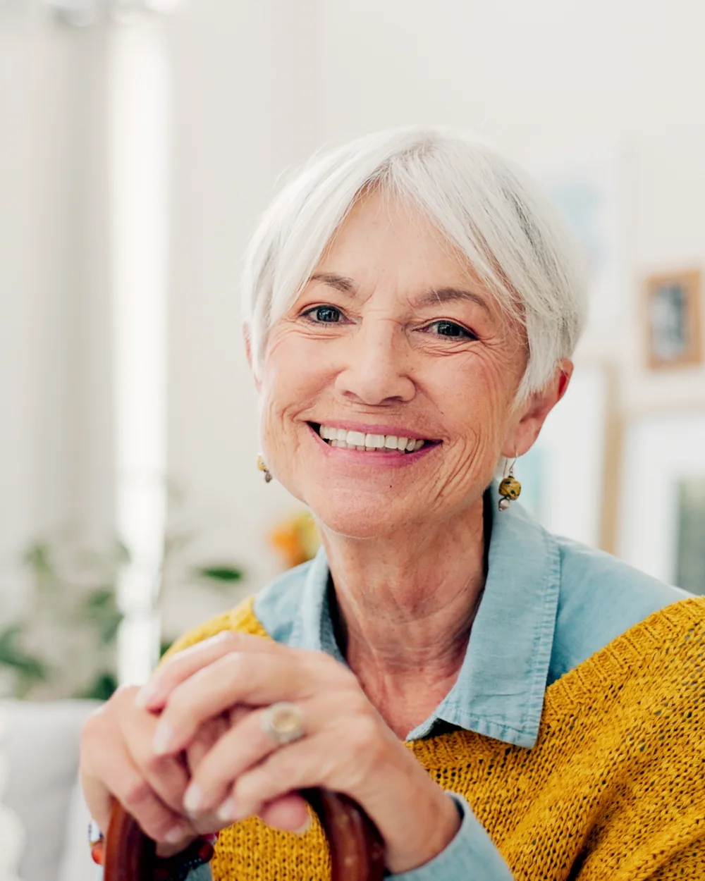 Smiling older woman relaxing at home