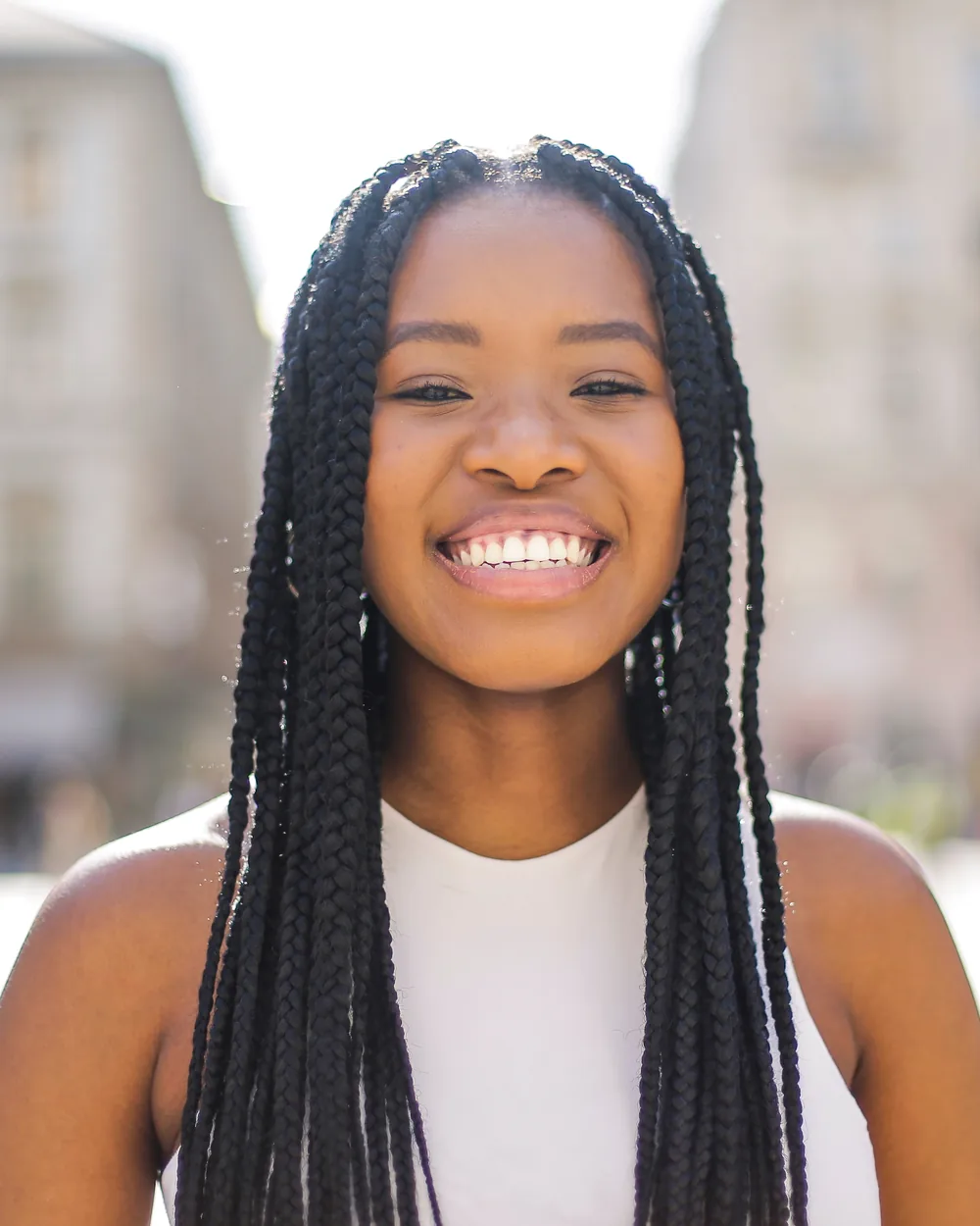 Smiling young woman outdoors